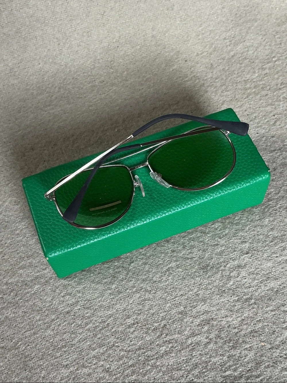 Prada Silver Frame Sunglasses with Green Lenses